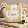 Donkey Milk Soap – soap beside a bunch of white flowers